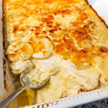 Scalloped potatoes served in baking dish