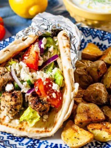 Chicken souvlaki in a pita wrap.