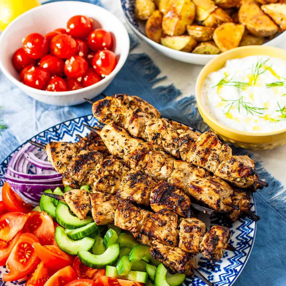 A platter of chicken souvlaki kebabs.