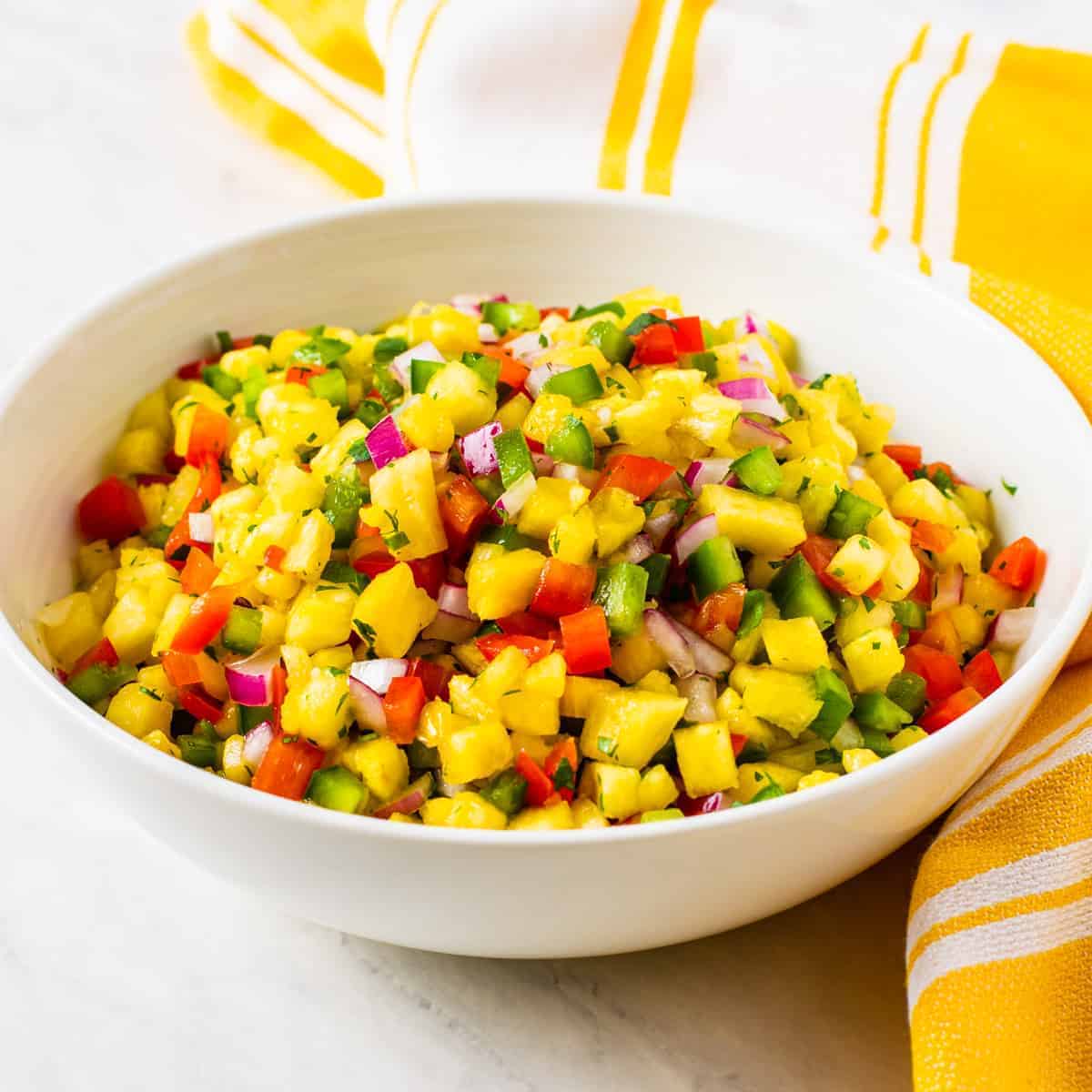 A bowl of fresh pineapple salsa