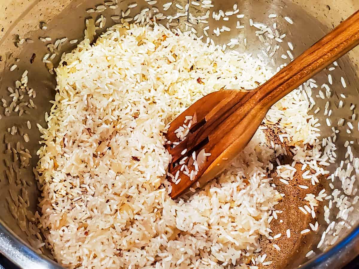 Rice shown being sauteed in the Instant Pot.