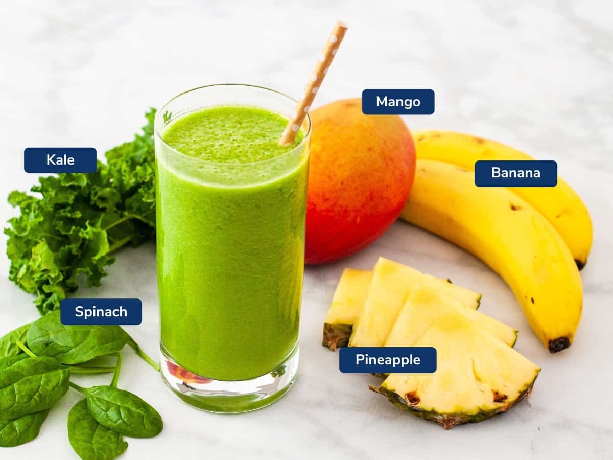 Ingredients for the smoothie shown set on a countertop.