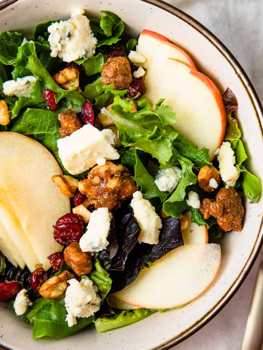 Overhead view of a bowl of apple walnut salad.