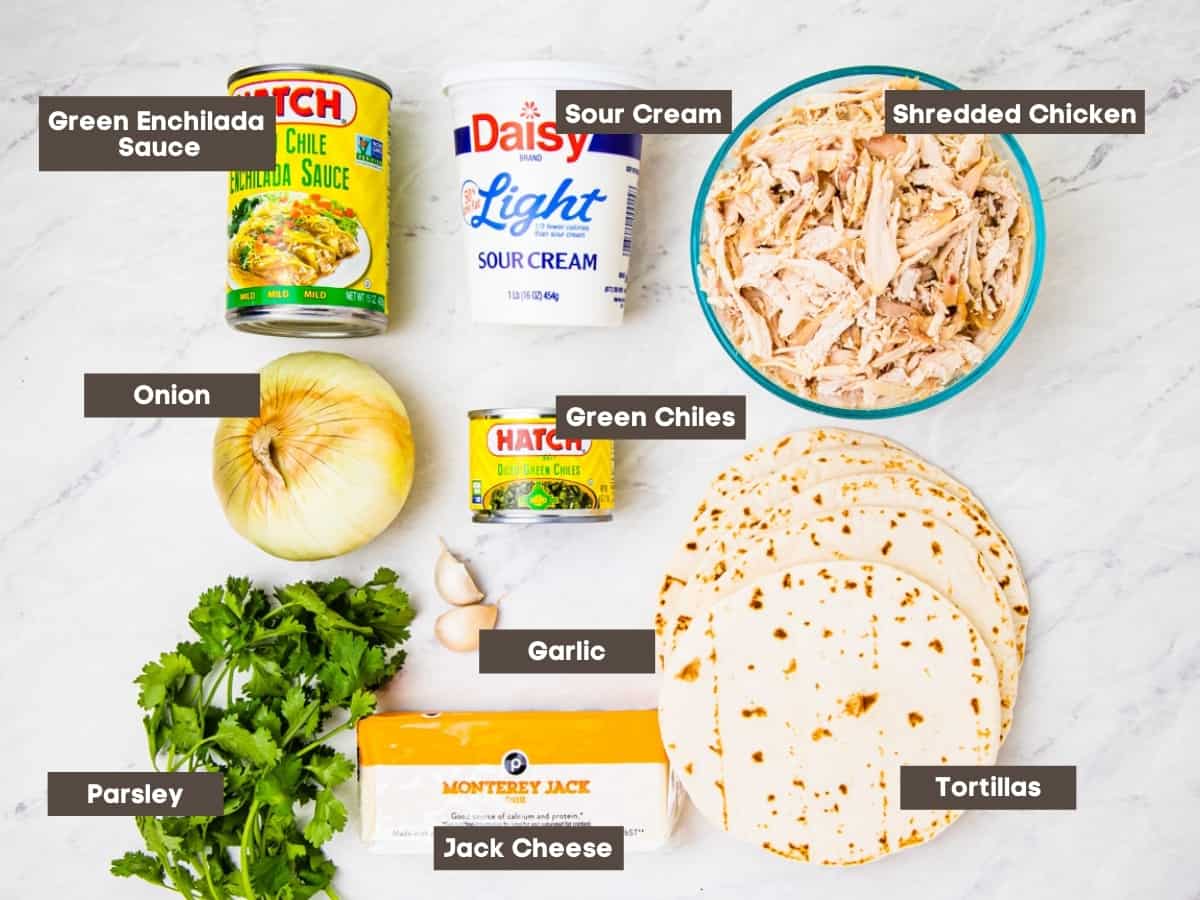 Labeled ingredients for the enchiladas are shown set on a counter.