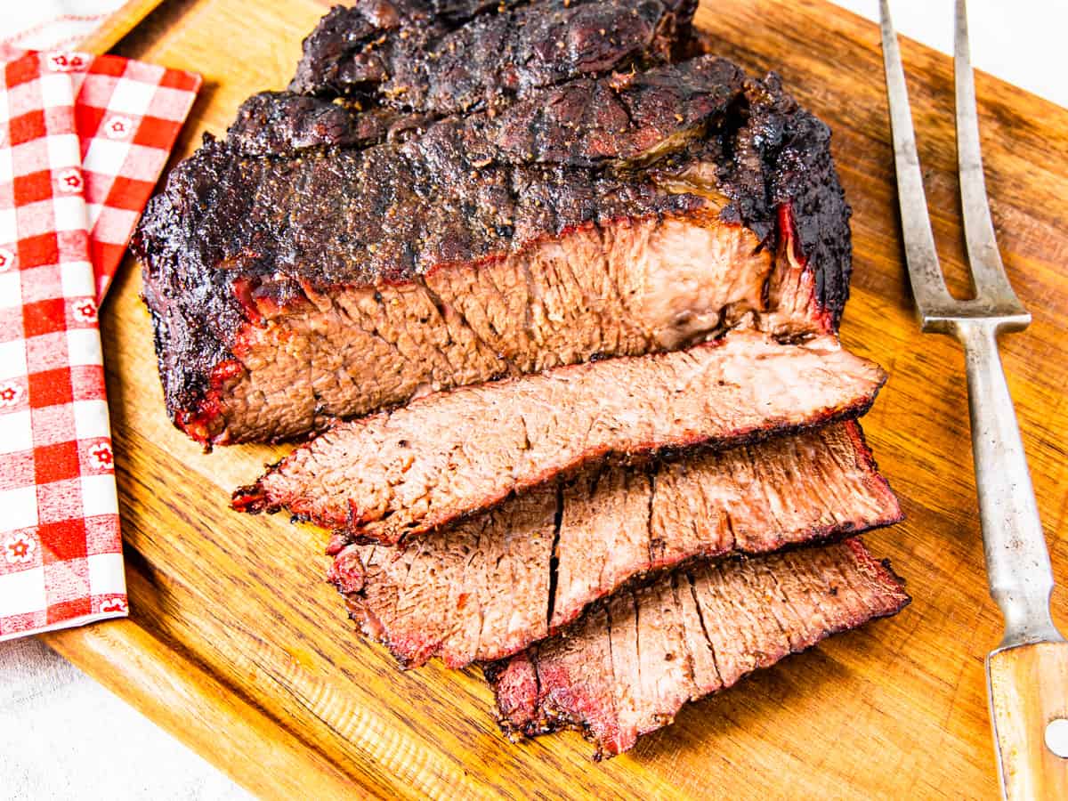 Sliced chuck roast shown on a cutting board.