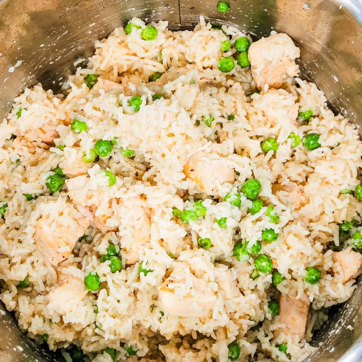 The finished chicken and rice is shown in the Instant Pot. 