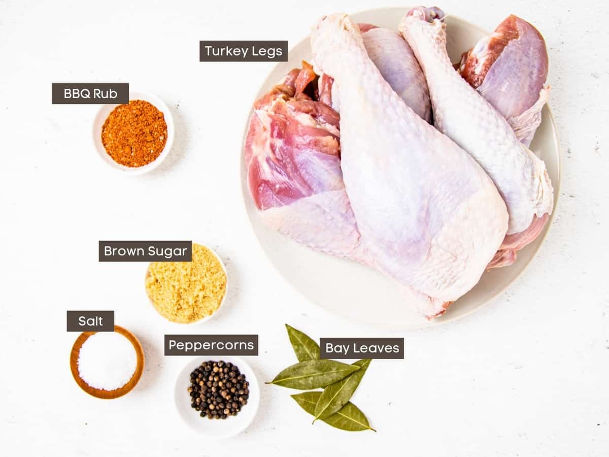 Ingredients for turkey legs shown arranged on a counter. 