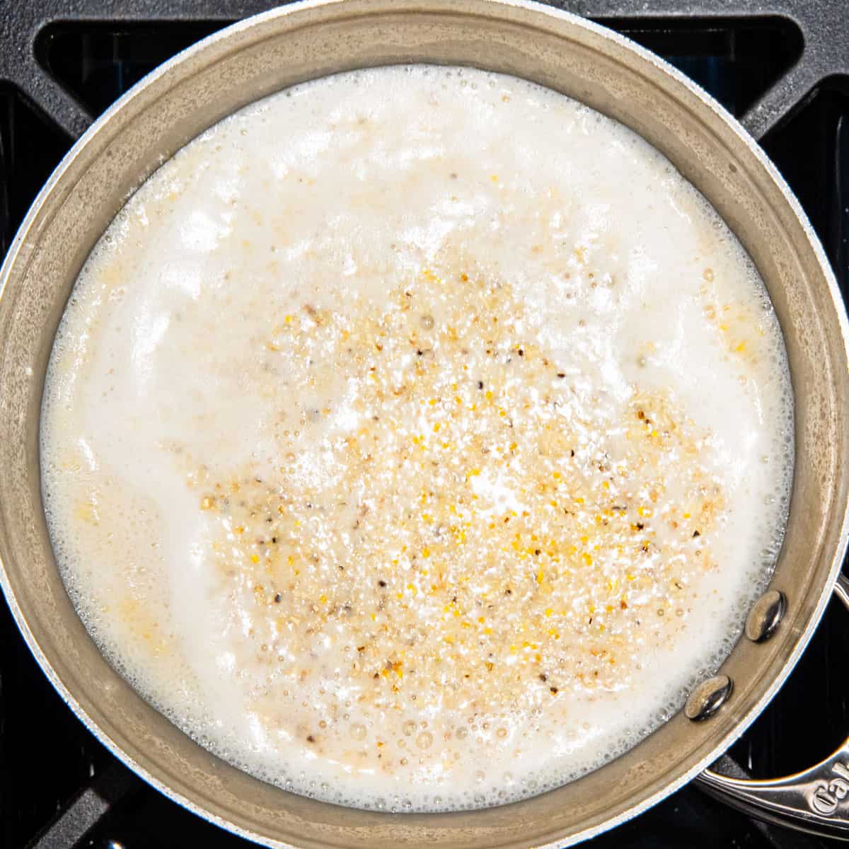 Grits cooking in a pot.