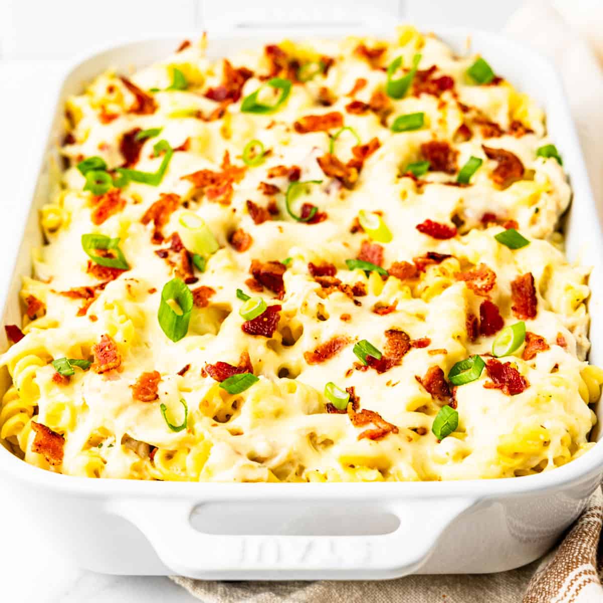 Baked chicken bacon ranch pasta in a casserole dish. 