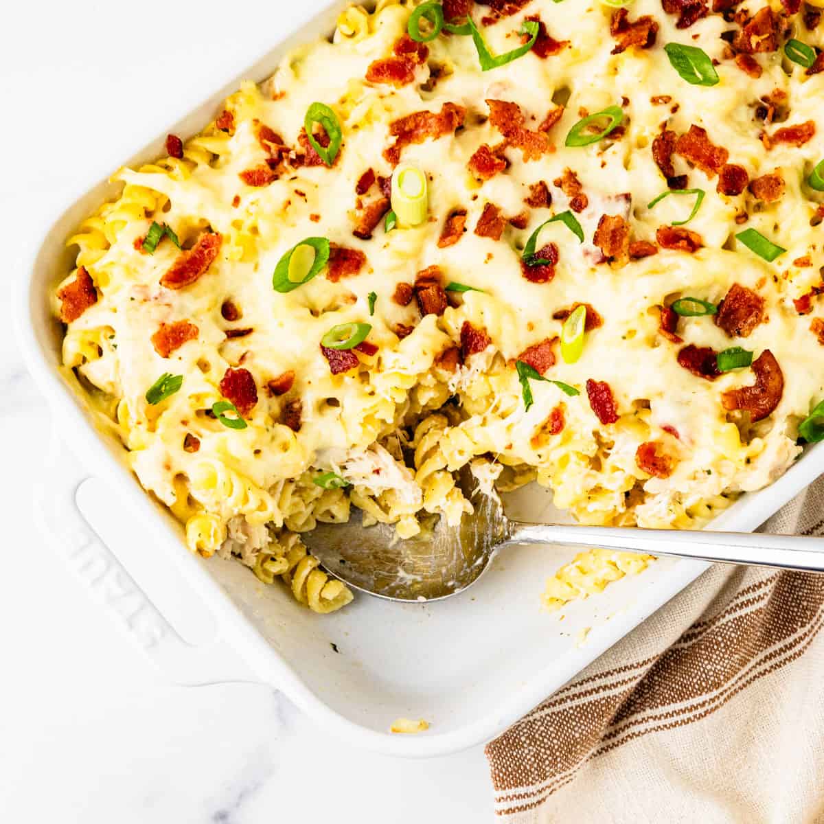 A casserole dish of chicken bacon ranch pasta.