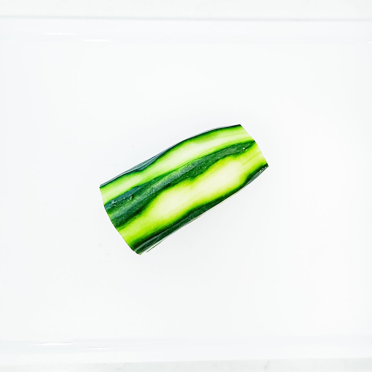 A peeled English cucumber.