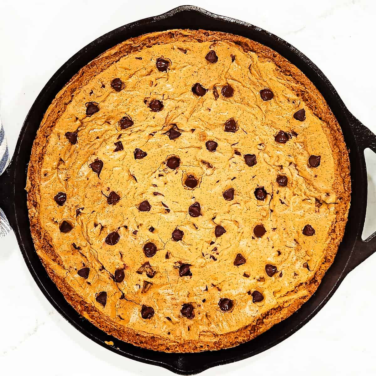 A baked chocolate chip skillet cookie. 