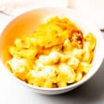 A bowl of macaroni and cheese.