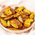 A bowl of roasted fingerling potatoes.
