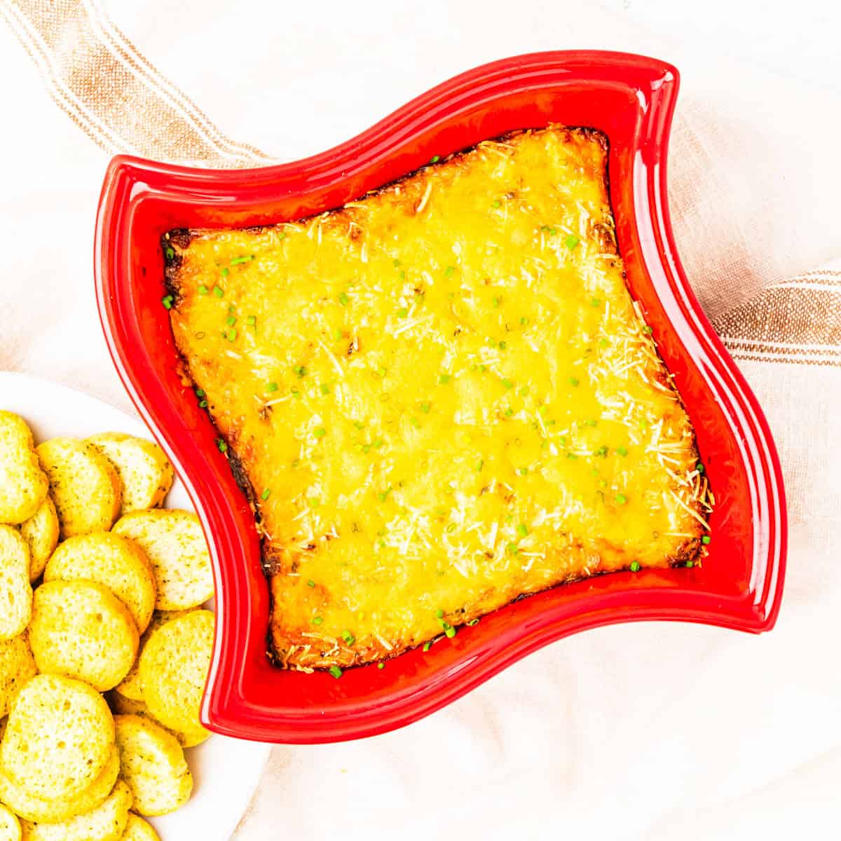 Baked crab dip in a baking dish.