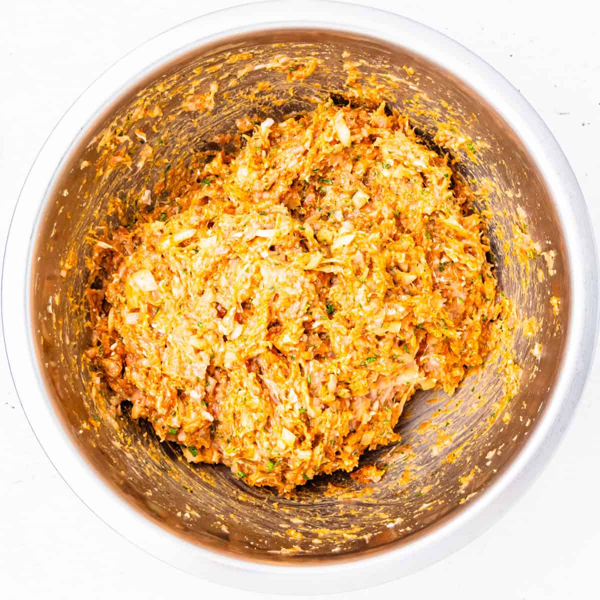 Chicken kofta mixture in a mixing bowl.
