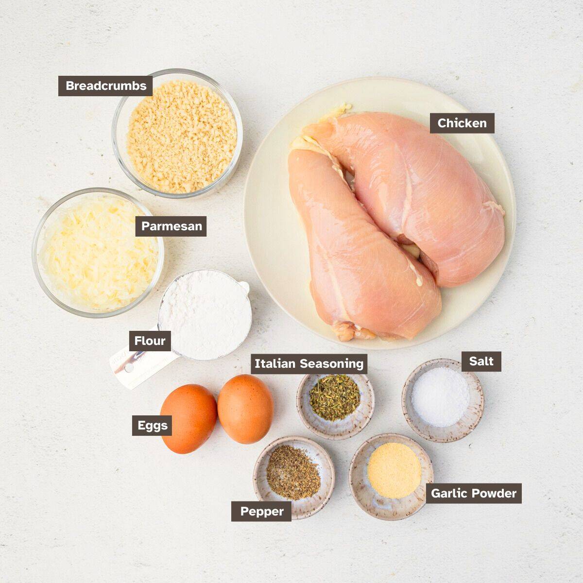 Ingredients arranged on a countertop in individual bowls.