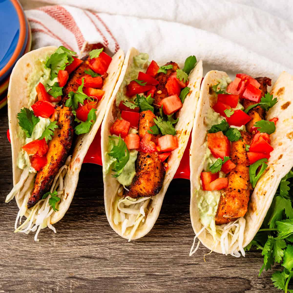 Mahi Mahi tacos on a serving tray.