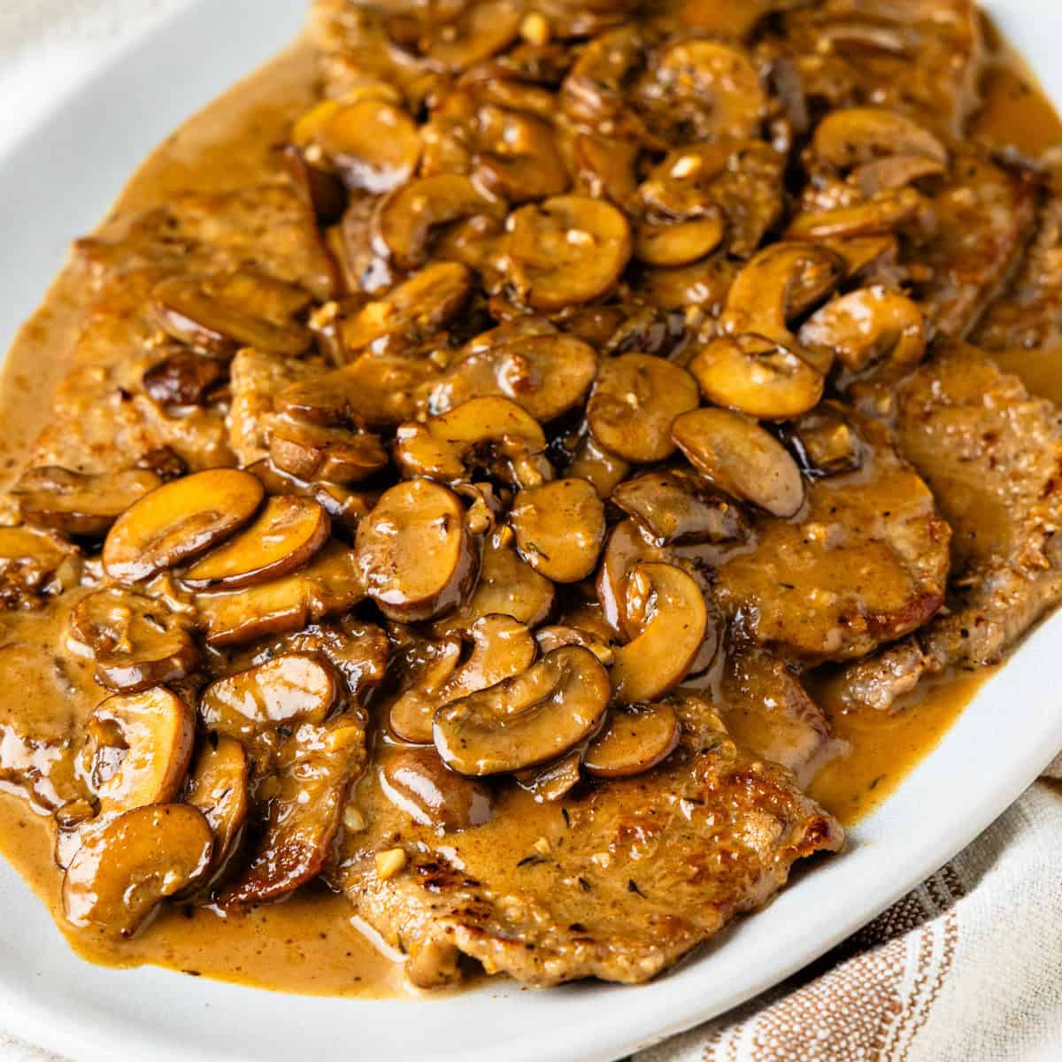 Veal marsala on a large platter.