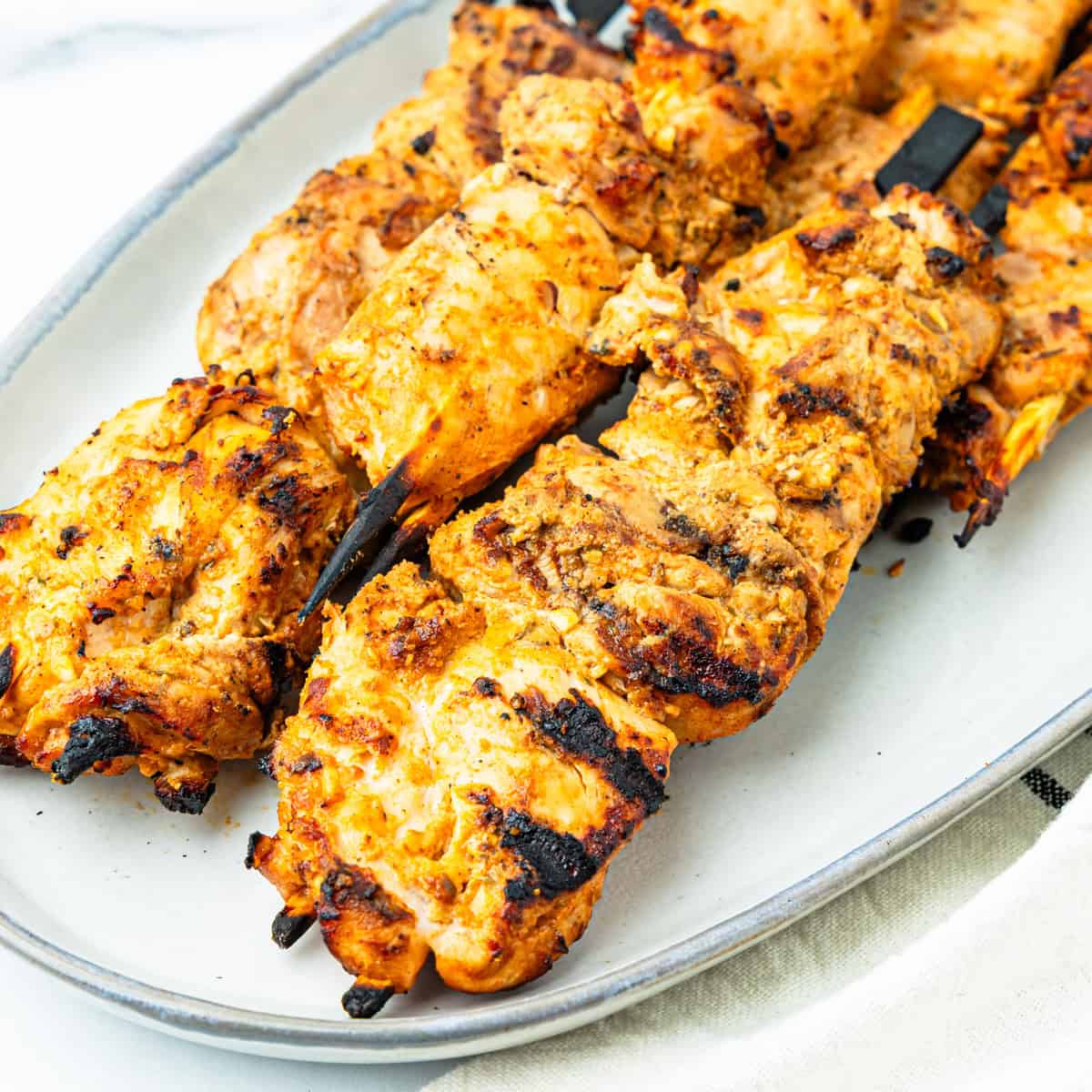 Chicken Kabobs on a platter.