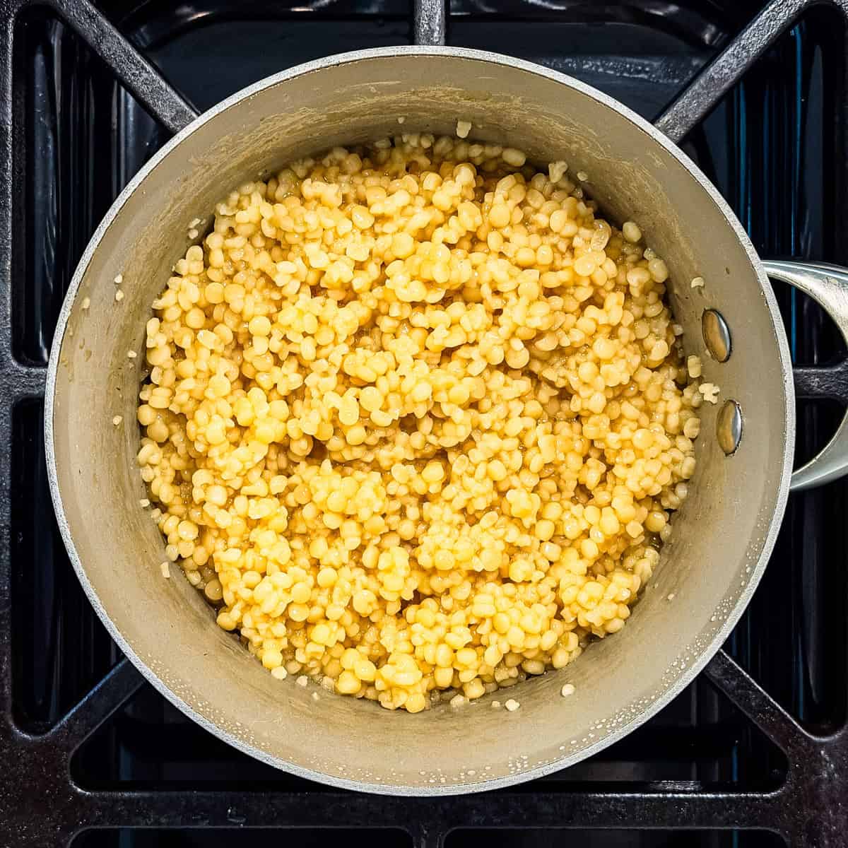 Cooked couscous in a pot.