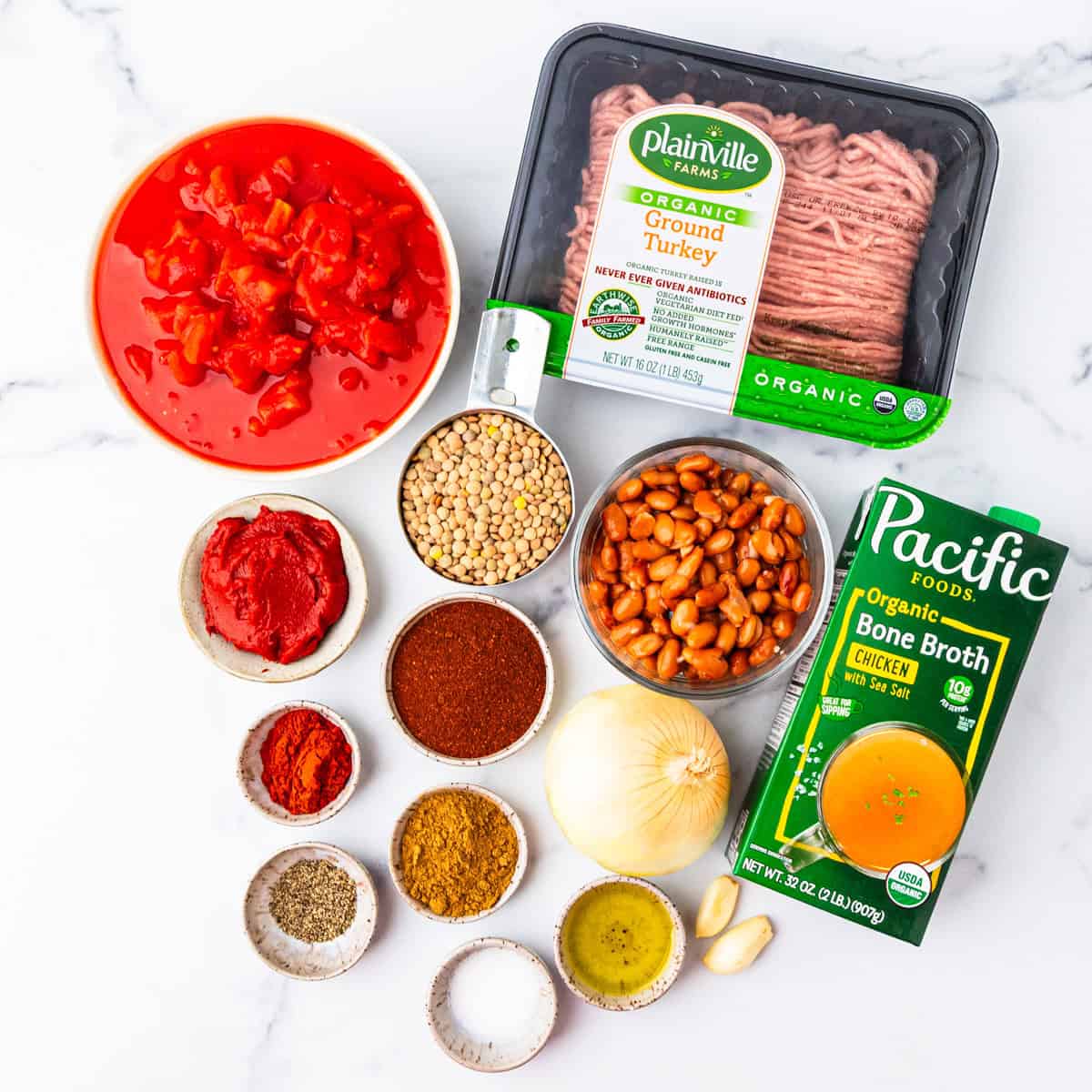 Ingredients for turkey lentil chili on a countertop.