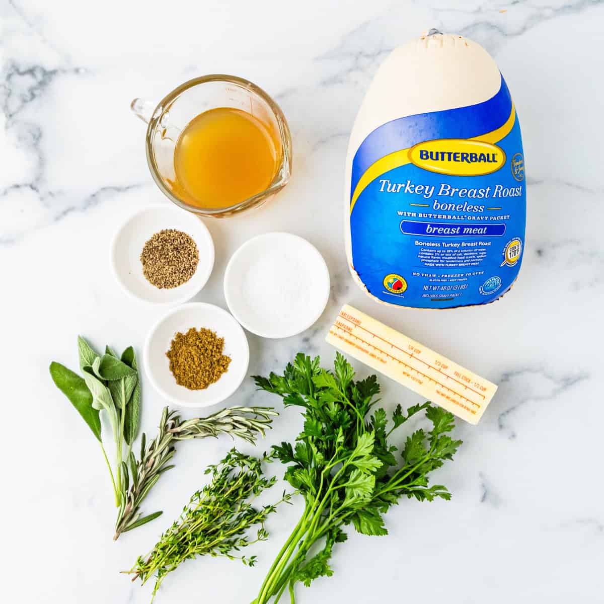 Ingredients for roasted boneless turkey breast arranged on a countertop.