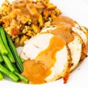 Roasted turkey breast smothered in gravy.